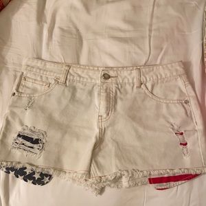 Justice white denim shorts with flag detail